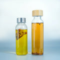 Eco-friendly Bamboo Lid Silicone Sleeve Durable Borosilicate Glass Water Bottle