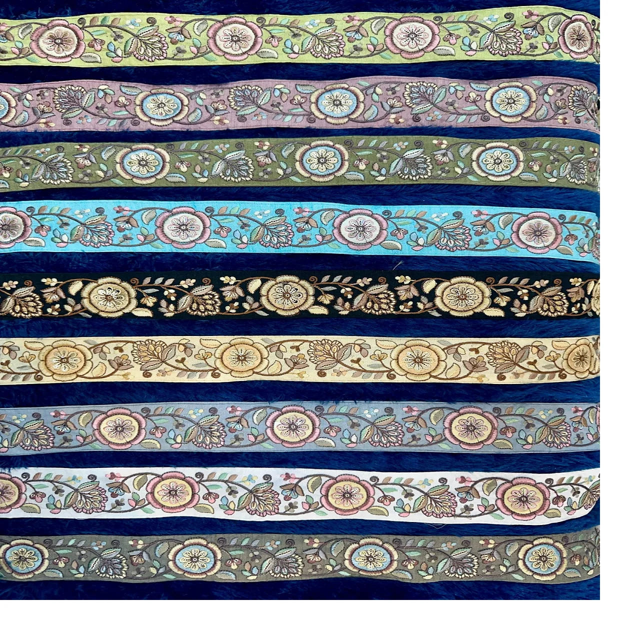 Custom made Premium floral lace fabric with intricate embroidery  available in multiple colours and patterns for resale.