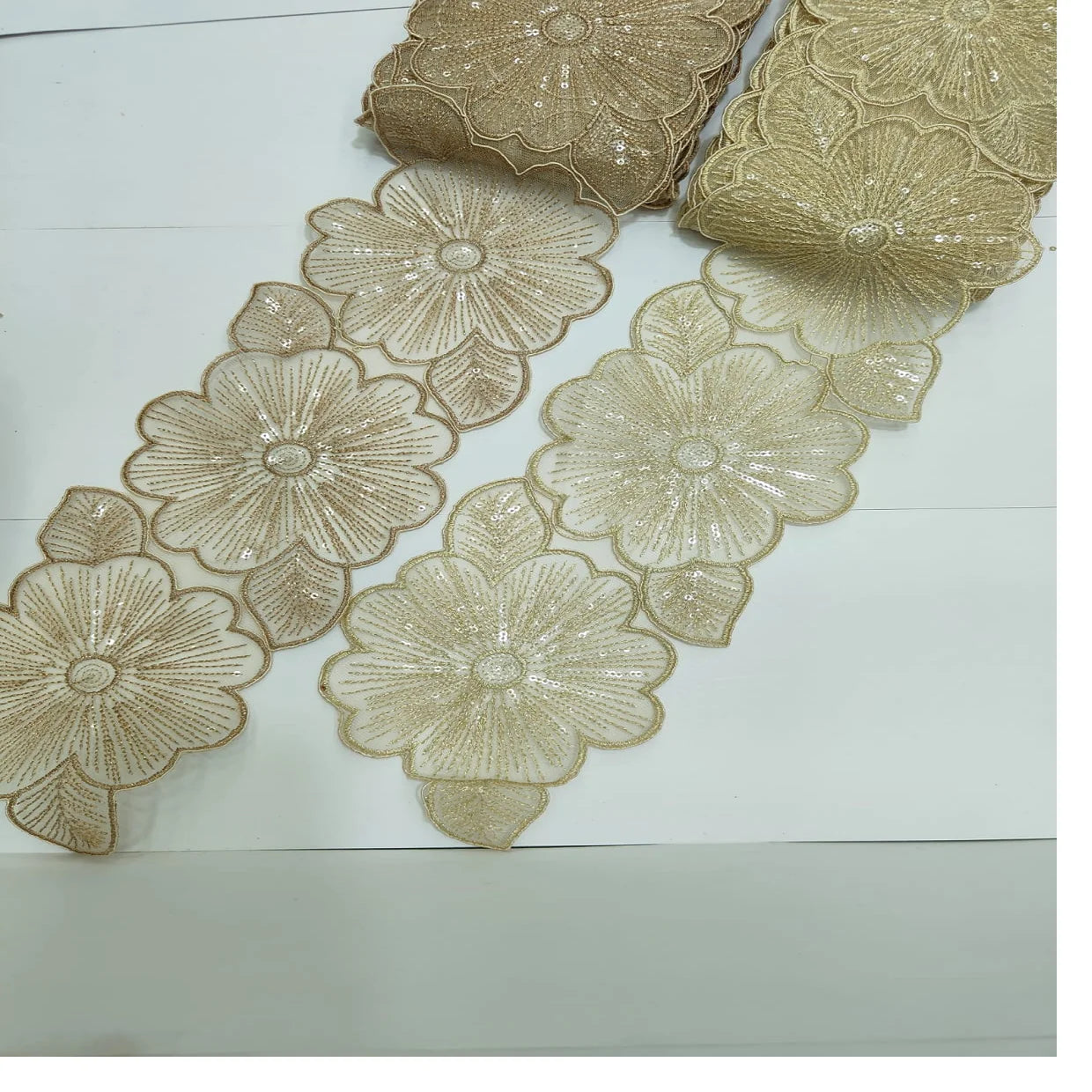 Custom made in cut work pattern floral designed embroidered laces in light beige coloured for bridal dresses and for resale.