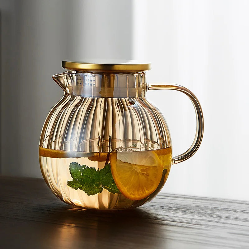 Wholesale 1350ml Small Pumpkin Ribbed Glass Pitcher for Both Hot Water and Cold Water