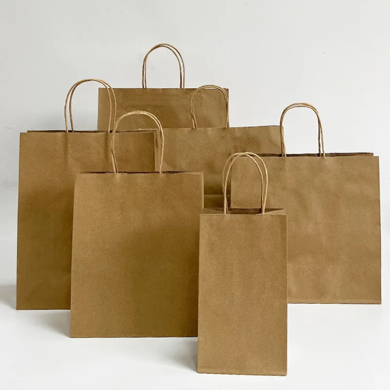 China Factory Custom Brown Kraft Paper Bag Classic Handle Disposable Biodegradable Packaging Bag for Apparel Shoe Gift
