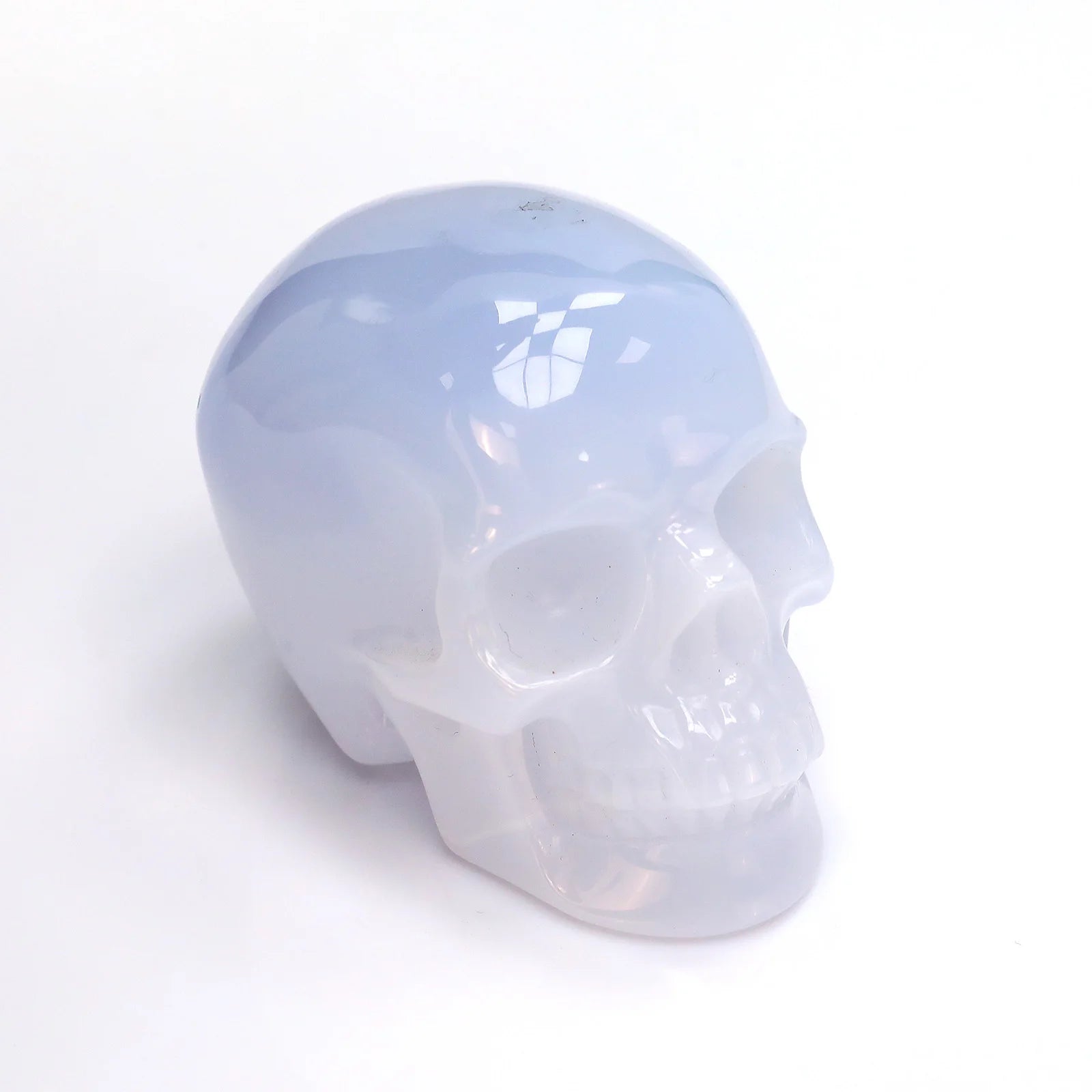 Hand Carved Natural Blue Chalcedony Crystal Skull Carving Statue Healing Stone Gemstone Crafts for Home Decoration Gifts