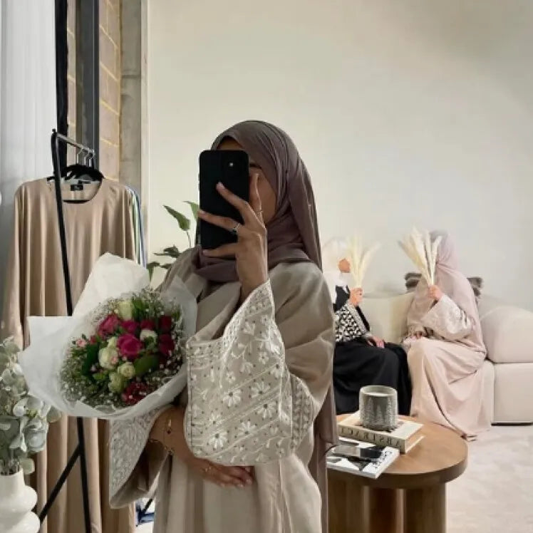 LM084 Gorgeous Daisy-Embroidered Linen Maxi Abaya Dress Closed Design with Belt Exuding Modesty