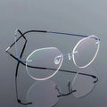Wholesale Ultralight Metal Round Computer Glasses Rimless Memory Titanium Eyeglasses Frames for Men Women