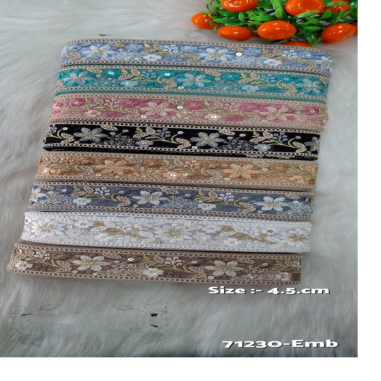 custom made floral embroidered laces in eight colour ways in ethnic designs with sequins work in 4.5 cms width for reselling.
