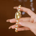 Aimgal Vintage Luxury Oval Arch Fashion Jewelry Quartz Watch 5A Zircon Bracelet Strap Gold Women's Steel Band ODM Supply