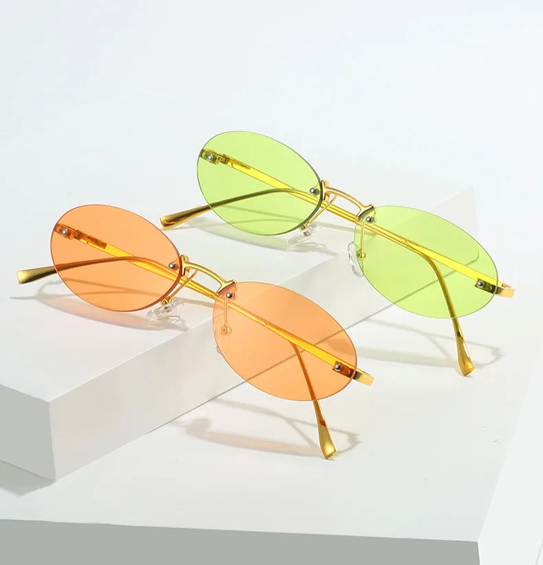 Vintage Metal Frame Uv400 Oval Lens Sunglasses Custom Logo Rimless Oval Orange Sunglasses Women