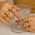 Wholesale Stainless Steel PVD 18K Gold Plated Flower Shape Ring Jewelry Five-Layer Hollow Interlocking Stackable Rings Set