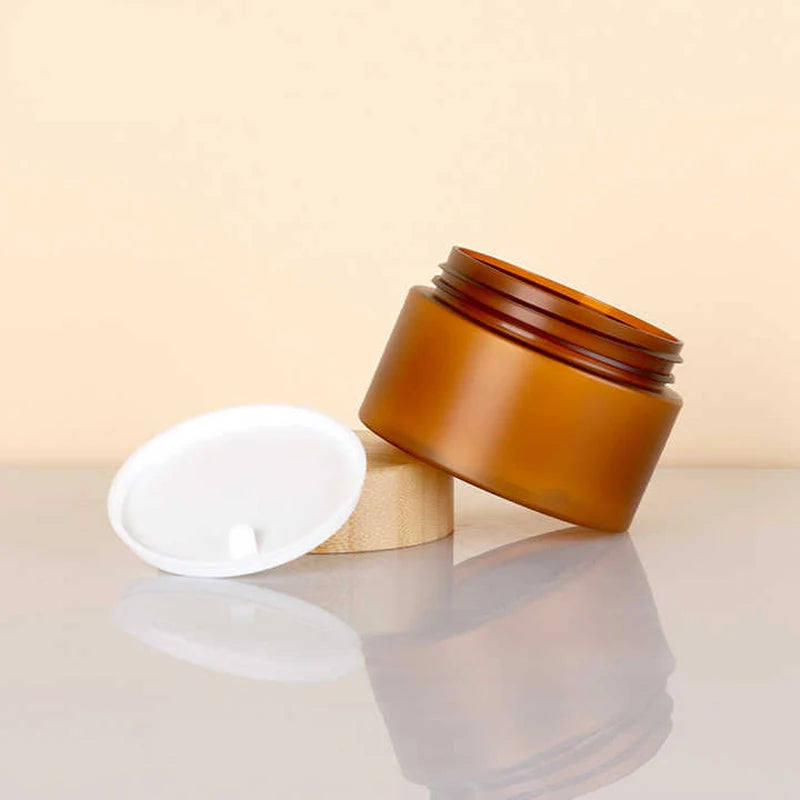Wholesale 50ml 150ml 250ml 500ml Amber Matte Plastic Jars with Bamboo Lid Round Shape Cosmetic Cream Jar