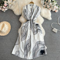 Boutique Wholesale 2026 Summer New Gentle Short Sleeved V-neck Waist Collection Mid Length A-line Women's Dress