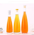 Free Sample Custom Labels 750ml Empty Drinks Glass Bottle for Juice 0.75L Clear Beverage Bottles