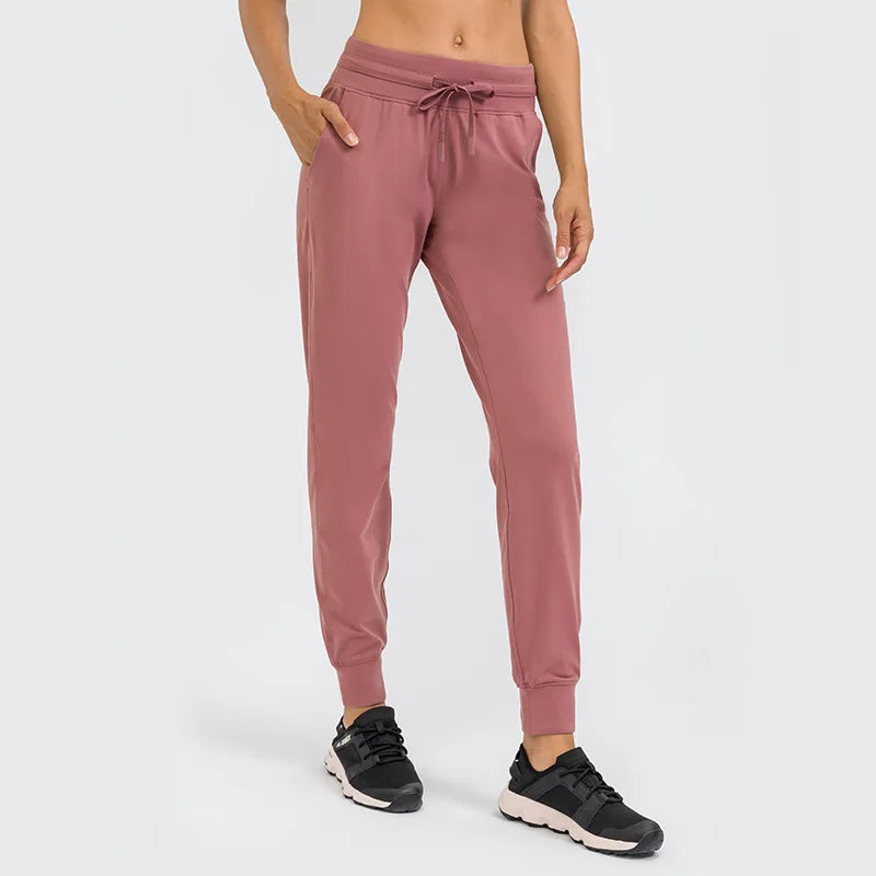 Wholesale Custom Side Pockets Four-Way Stretch Breathable Elastic Waist Solid Sweatpants Women Nylon Track Jogger Pants