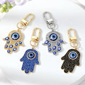 Good Quality Enamel Turkish Hasma Fatima Hand Lucky Evil Eye Keychain Accessory for Key Bag
