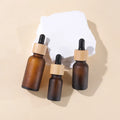 Skincare Cosmetic Packaging 18mm 15ml 30ml 50ml Bamboo Essential Oil Dropper Bottle Brown Amber Glass Bottle