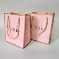 Hot Customized Hot Stamping Logo Deluxe Matte pink Gift Bags Recyclable Mall Garment Bags