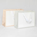 HONPAK Luxury Eco-friendly 100% Recyclable White Paper Bag Bulk in Stock Wholesale with Edge Printing for Promotions