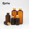 60ml 120ml 250ml 500ml Amber Frosted Plastic Pet Pump Lotion Bottle With Bamboo Lid for Shampoo Conditioner and Bath Oil