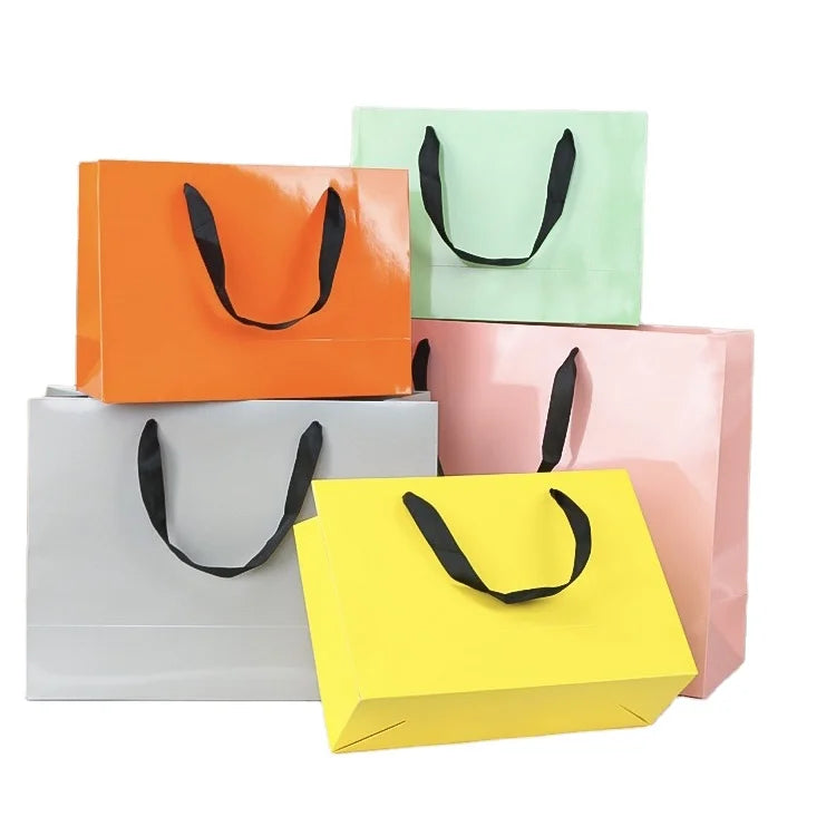 Custom Logo Luxury Glossy Tote Shopping Paper Bag With Ribbon Handle Wholesale Retail Gift Garment Cosmetic Packaging Paper Bag