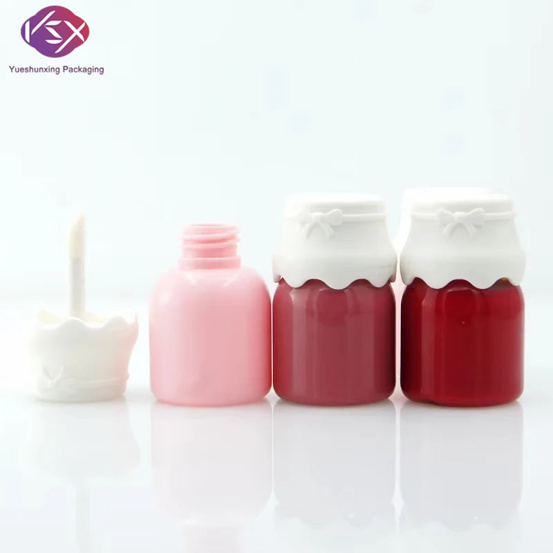 Yueshunxing 8ml Special Shape Latest Mini Cute Kids Custom logo pink Plastic Packaging Bottle White Lid Lip Gloss Tube