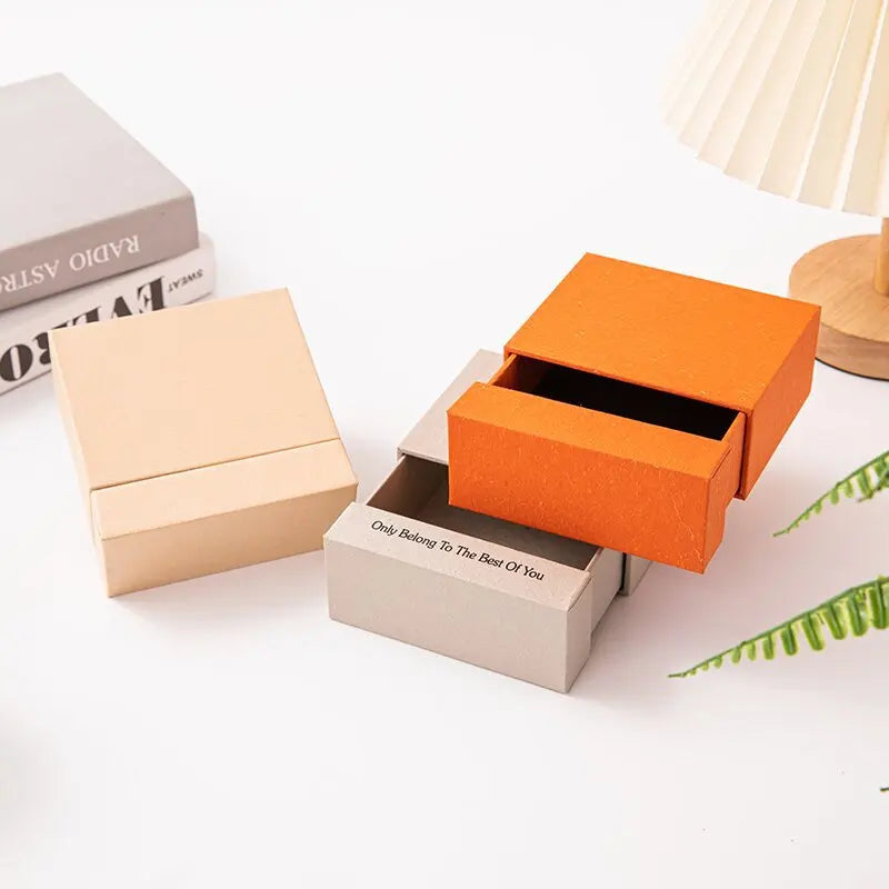 2023 Unique Crumpled Paper Sliding Drawer Jewelry Packaging Gift Box Competitive Price Embossing Elegant Slide-out Drawer Design MegaBDM