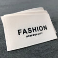 Cheap Free Made Design Woven Clothing Labels Personalized Price Satin Pink Glitter Silk Center Fold Washable Adhesive Label