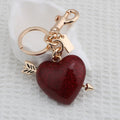 Advanced Arrow Cross Heart Bag Charm for Purse Bag Pendant Handbags Car Red Resin Love Heart Jewelry Accessories Cute Keychain