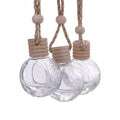 Wholesale 10ml Flat round Car Hanging Glass Perfume Aromatherapy Diffuser Bottle Refillable Cylinder with Wood Caps