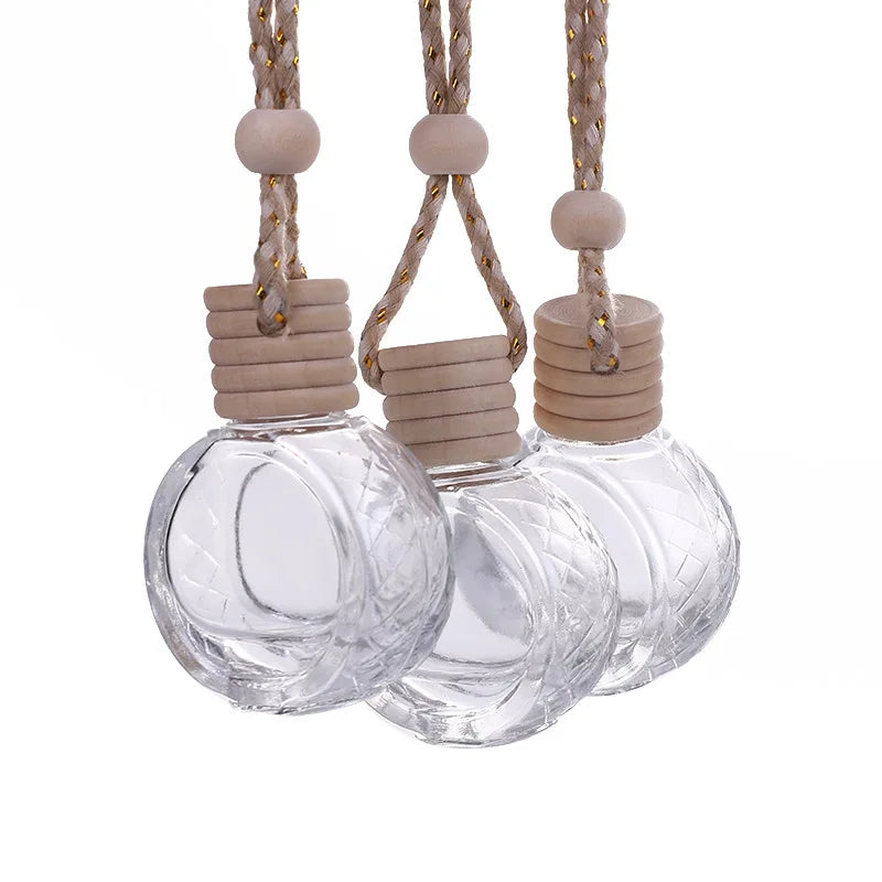 Wholesale 10ml Flat round Car Hanging Glass Perfume Aromatherapy Diffuser Bottle Refillable Cylinder with Wood Caps