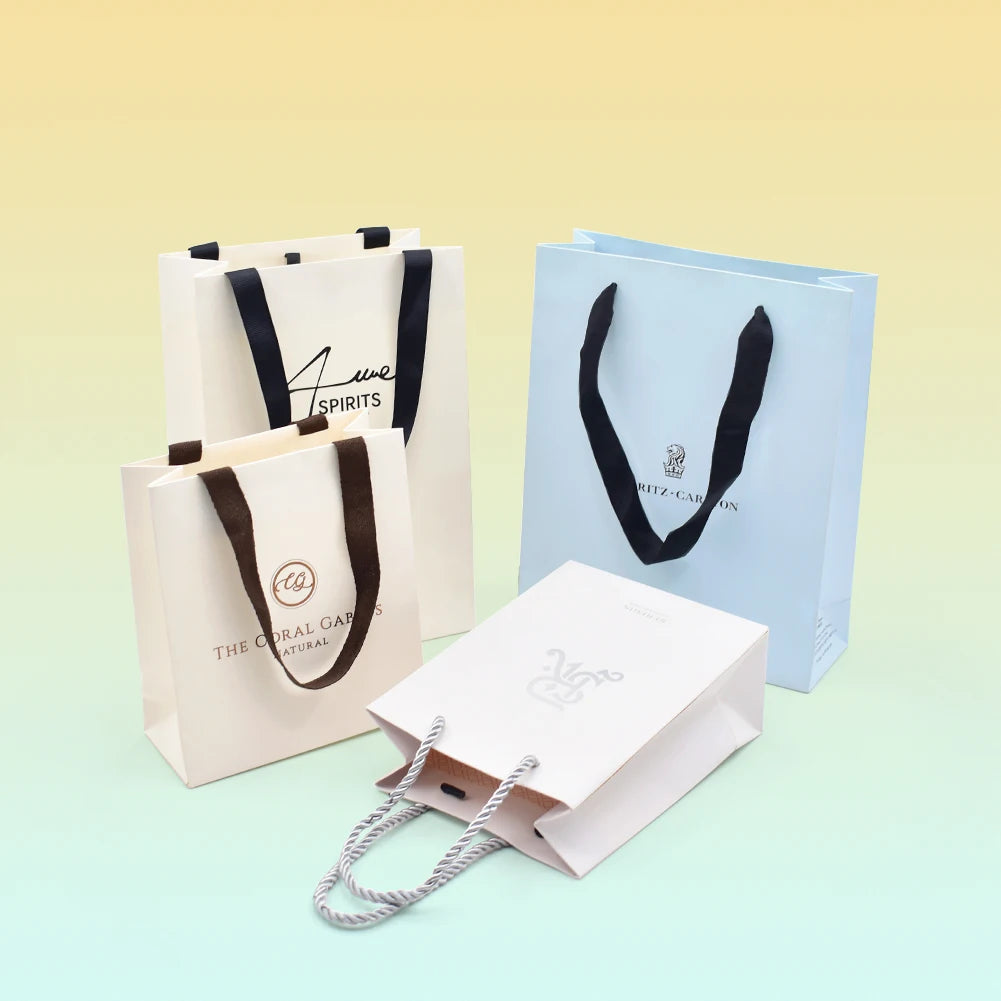 Recyclable Packaging Box with Ribbon Handle Big Bags pink Manufacturer Custom logo Luxury Transparent Silver Art Paper