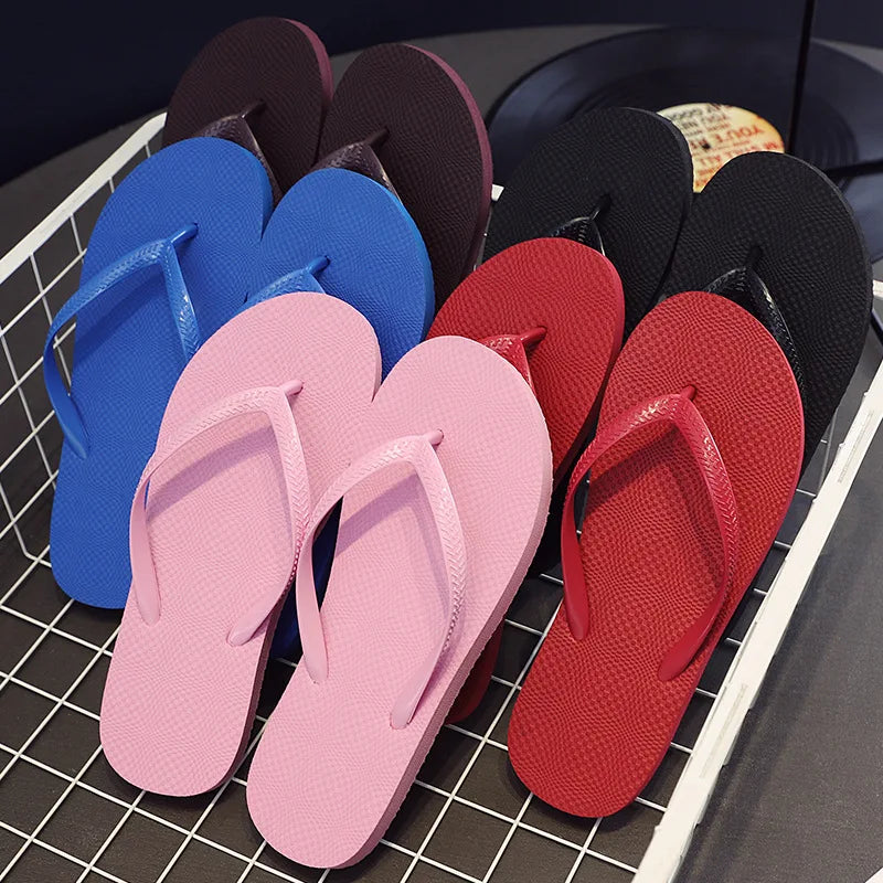 Wholesale Anti-Slippery PVC Flat Beach Thong Slipper New Fashion Simple Cheap Flip Flops for Girls for Outdoor Wedding in Spring