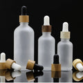 Empty Cosmetic Frost Glass Dropper Bottle Bamboo Essential Oil 15ml 30ml 50ml 100ml Dropper Bottles White Porcelain Bottle