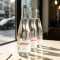 Hot Sale 330ml 500ml 750ml Glass Bottle for Water Beverage Juice Sparkling Soda Mineral Water Glass Bottle with Screw Cap