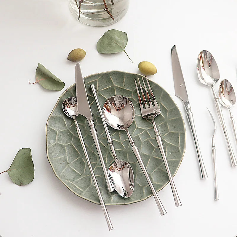 Wholesale 24-Piece Luxury Stainless Steel Flatware Set Modern Silver Cutlery with Slim Tapered Handle for Hotel