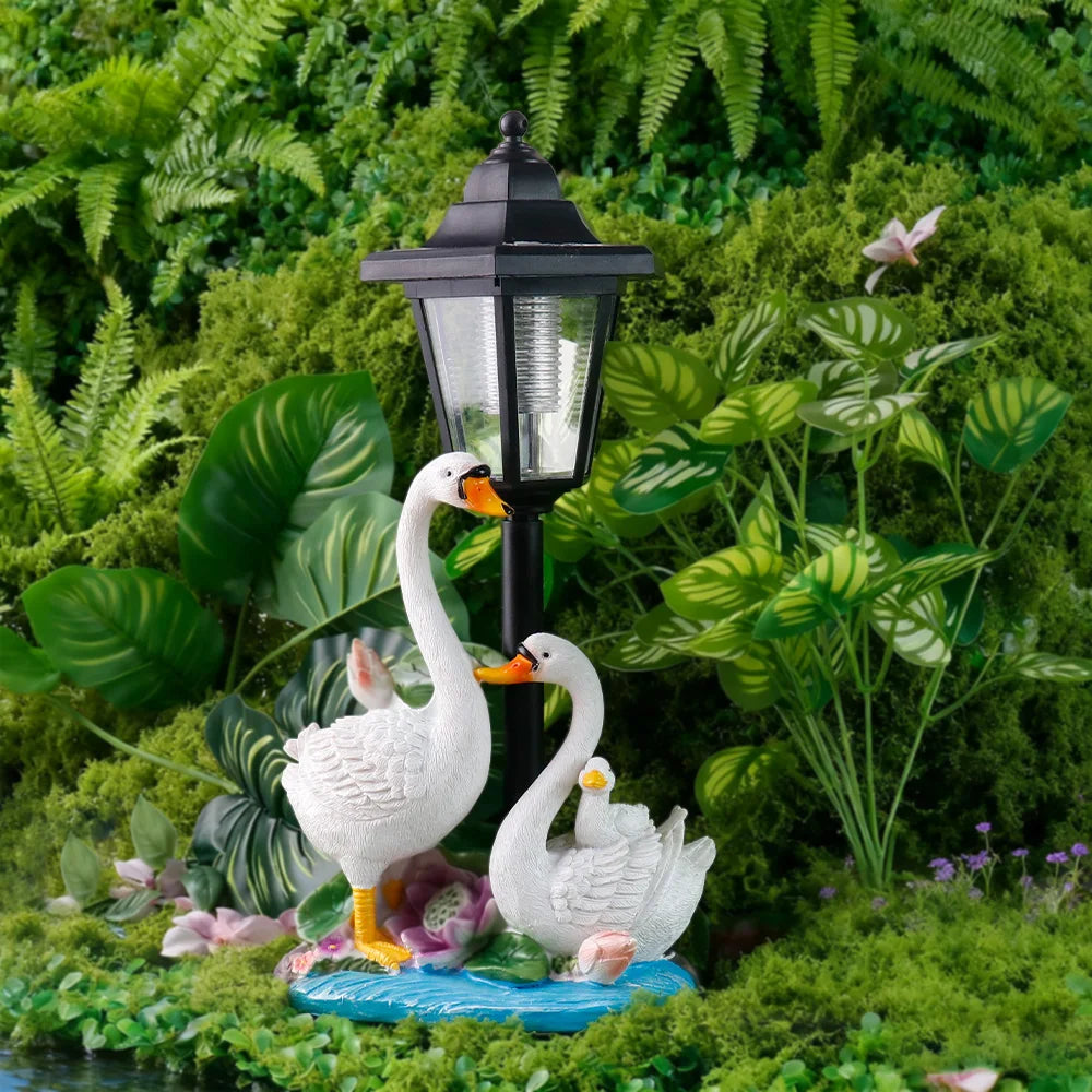 Solar Powered Swan Family Resin Sculpture with LED LampWhite Swans on Blue Base with Lotus LeaveOutdoor Garden Decor for Yard