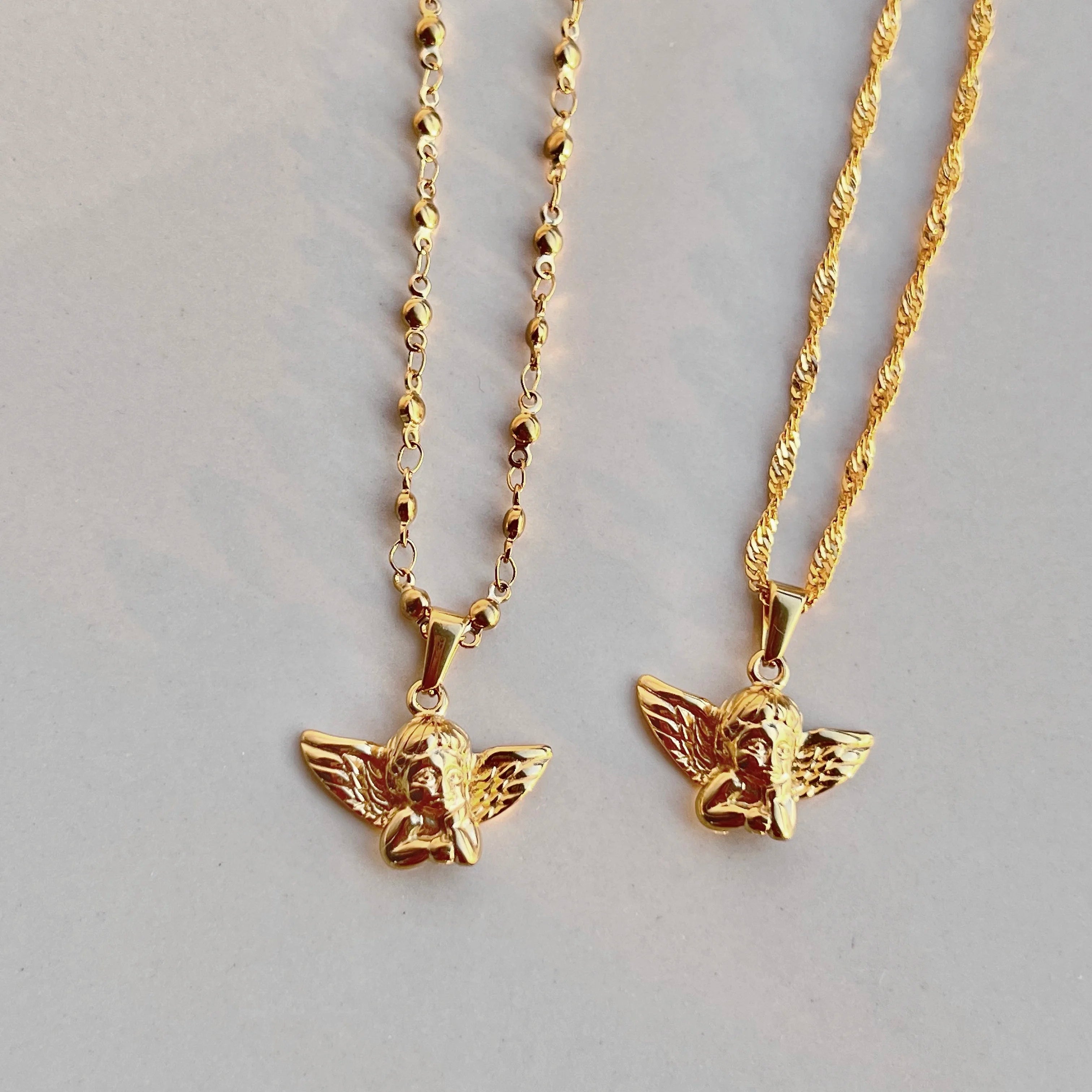 2022 Dazan New Ins Wholesale 18k Gold Plated 316l Stainless Steel Carve Dimensional Angel Cupid Chopin Chain Bead Chain Necklace