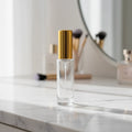 Empty High Quality clear OEM ODM Cylinder 25ml Glass Perfume Bottle in Stock Easy Use Refillable Low MOQ Gold Cap