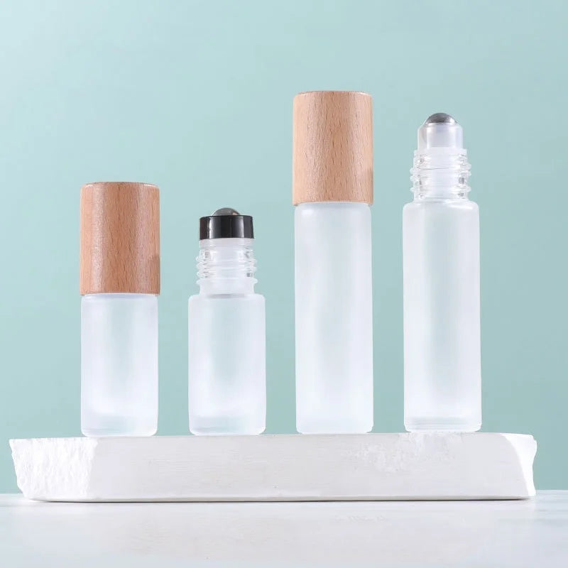 Luxury Wood Cap Metal Roller Essential Oil Bottle 5ml 10ml Refillable Empty clear Frosted Round Glass Perfume Roller Bottle