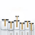 Wholesale 45 85 100 180 280 380 500 730 Ml Empty Honey Jars Pot Jam Packaging Luxury Hexagon Glass Bottle Honey With Metal