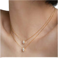 Wholesale 18K Gold Stainless Steel Crystal Necklace with Non-Tarnish Tear Drop Pendant Featuring One Stone Oval Zircon Charms