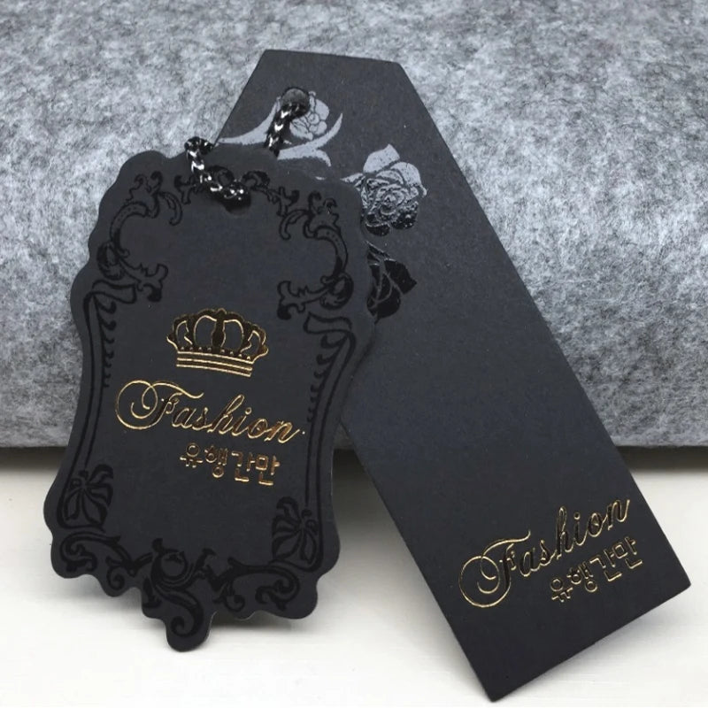 Custom Luxury Special Shape Swing Paper Gold hang Tages Pvc Cover for Clothing Garment