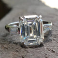 White Gold 3.89 TCW Emerald and Tapered Baguette Three Stone Engagement Moissanite Ring