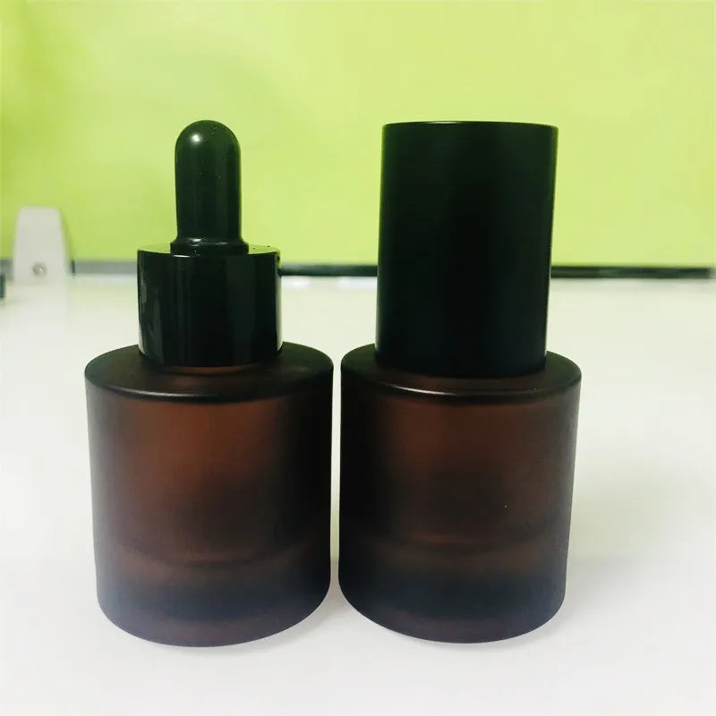 Frosted Amber Glass Bottle 30 ml 50 ml 100 ml Brown Glass Cosmetic Bottle with Spray Lotion Pump and Black Cap