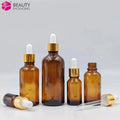 Essential Oil Bottle Amber 5ml 10ml 15ml 20ml 30ml 1oz 2oz 3oz Glass Dropper Bottle With Gold Dropper