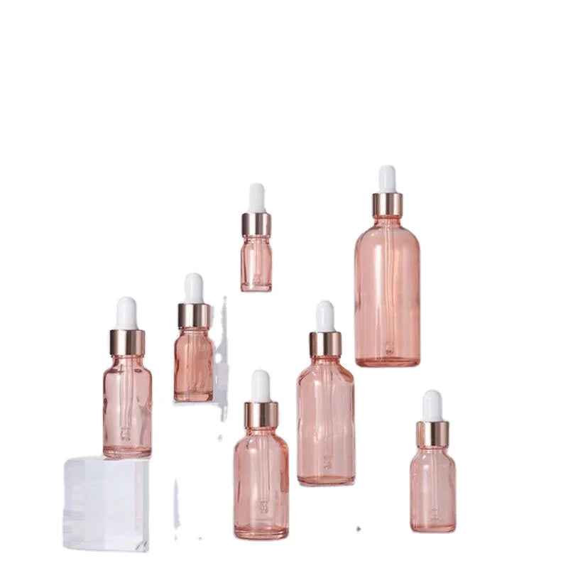 Luxury 5ml 10ml 15ml 20ml 30ml 50ml 100ml Pink Glass Cosmetic Serum Eye Oil Dropper Bottles with Rose Gold Aluminium Pipette Cap