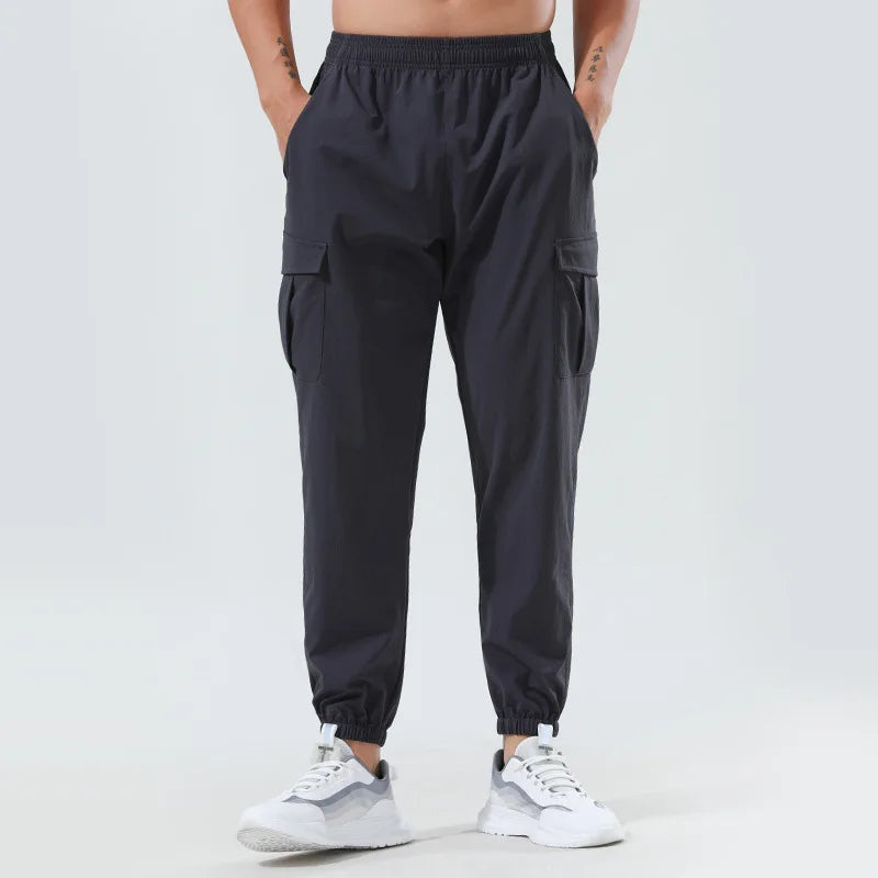 Xsunwing OEM ODM Men Casual Fashion Simple Nine-point Pants Loose Quick-dry Sweatpants Cargo Sports Pants Men's Trousers MSJ2920
