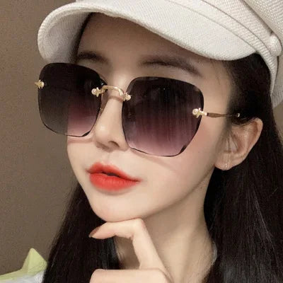 HANSIDON Fashion Wave Frame Rimless Sunglasses New New Arrivals Colorful Ocean Lens UV400 Sun Glasses