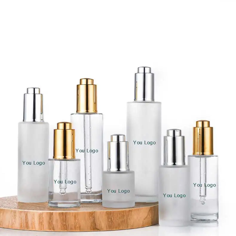In Stock Clear Frosted Serum Glass Dropper Bottle 15ml-100ml Sizes with Gold/Silver Push Dropper for Face Cream