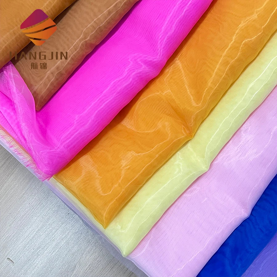 Hot Sale 100% Polyester Shiny Liquid Bridal Sheer Organza Tulle Fabric Wedding Decoration Soft Organza Tissue Fabric for Dress