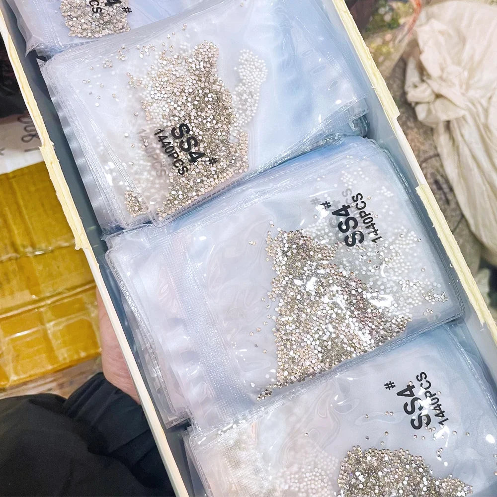 Wholesale Crystal AB Nail Stone SS3-SS50 Glass Flat Back Rhinestones Non-Hot Fix Plastic Bags Package for Nail Art Garments