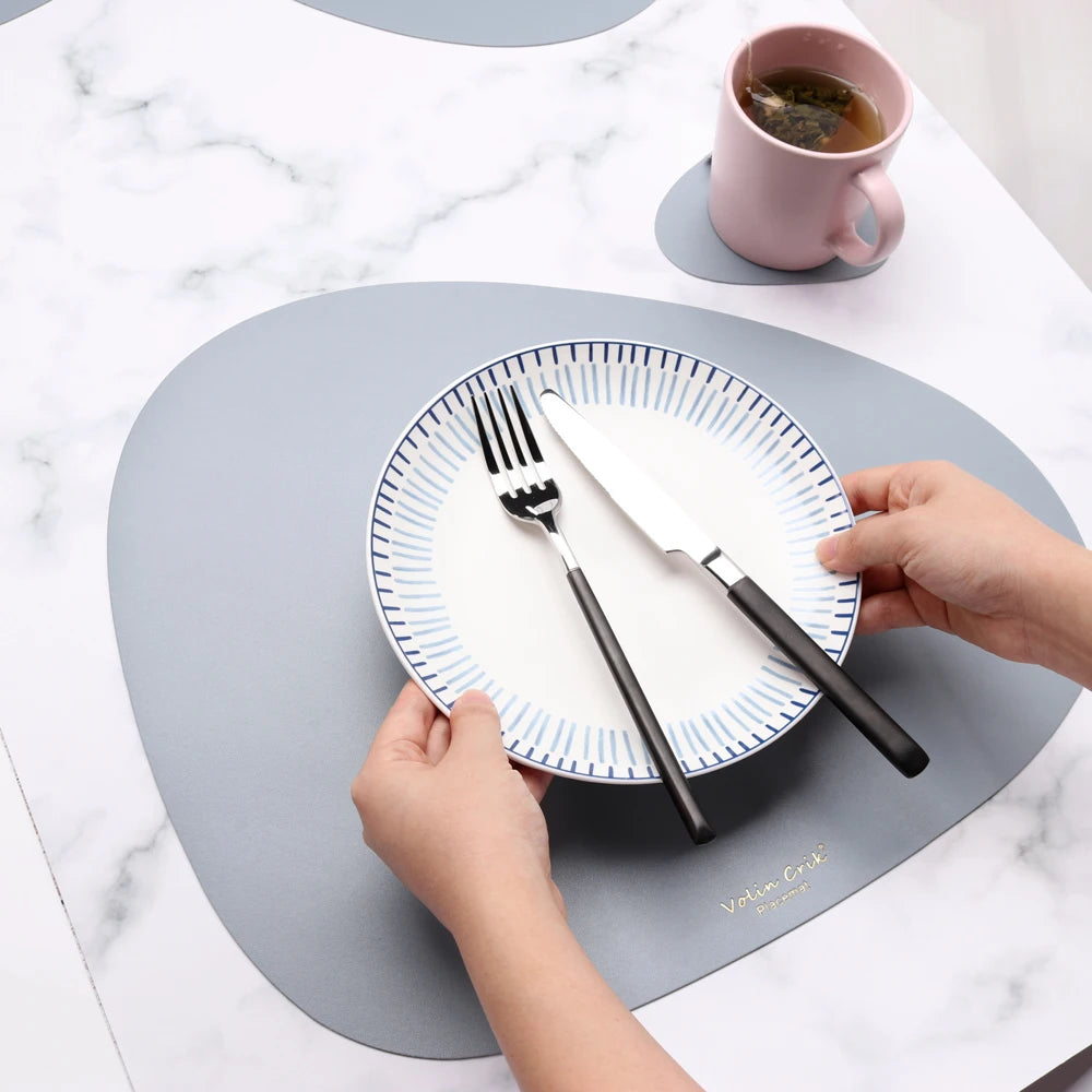 Wholesale Hot Custom Kitchen Dining Table Mats Pad Waterproof Coffee Washable Drop Shape PU Leather Placemats for Private Label